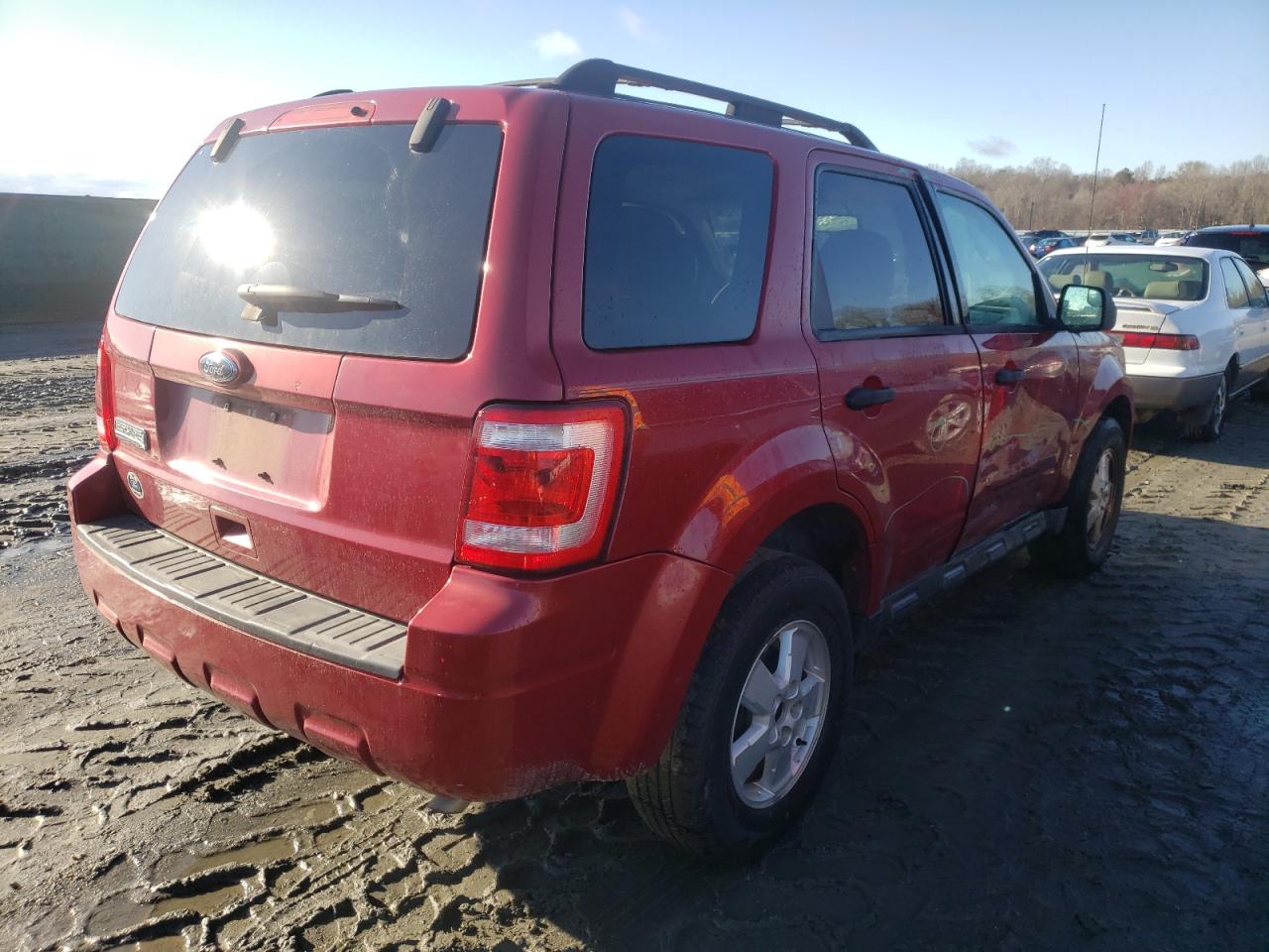 Photo 4 from auction – 2010 FORD ESCAPE with VIN 1FMCU0D73AKA69260