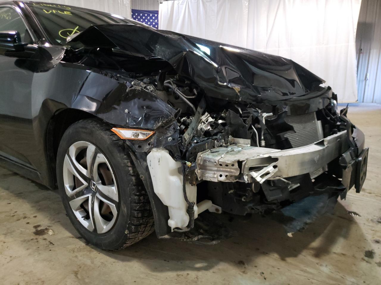 Photo 9 from auction – 2017 HONDA CIVIC LX with VIN 19XFC2F53HE209736