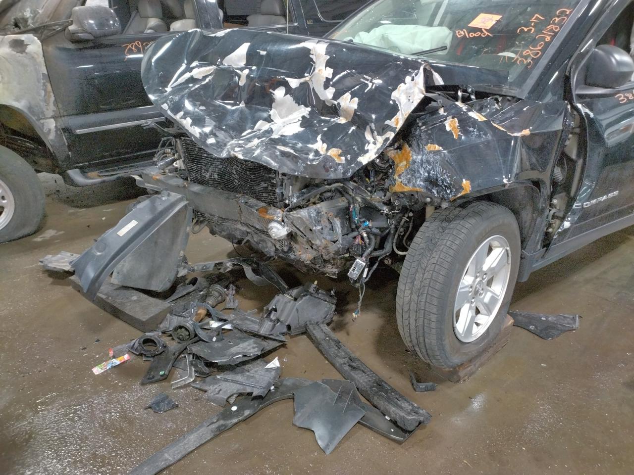 Photo 9 from auction – 2015 JEEP COMPASS SP with VIN 1C4NJCBA3FD262381