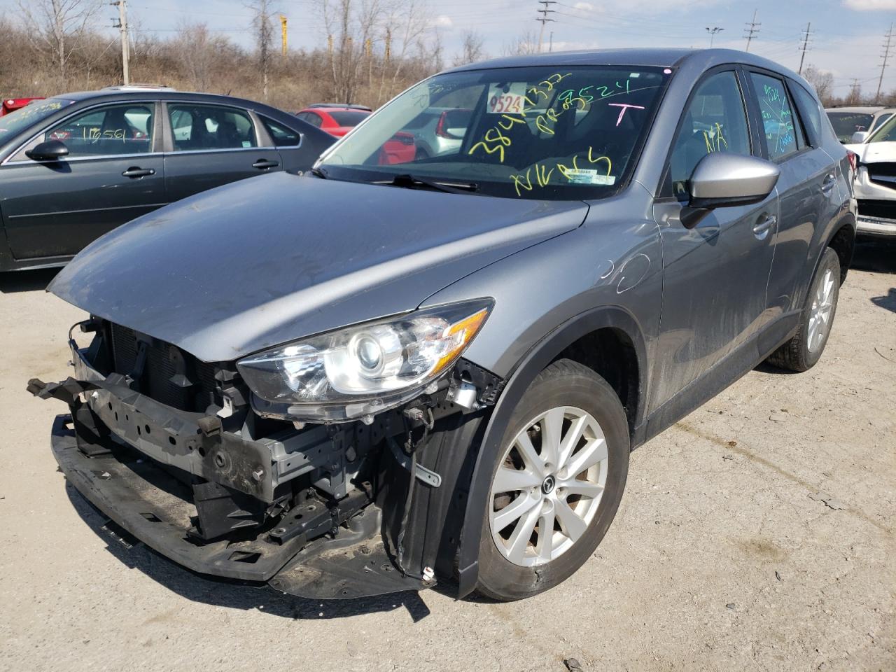 Photo 2 from auction – 2014 MAZDA CX-5 SPORT with VIN JM3KE2BE0E0358115