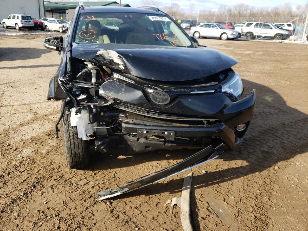 Photo 9 from auction – 2016 TOYOTA RAV4 XLE with VIN 2T3RFREV2GW438488
