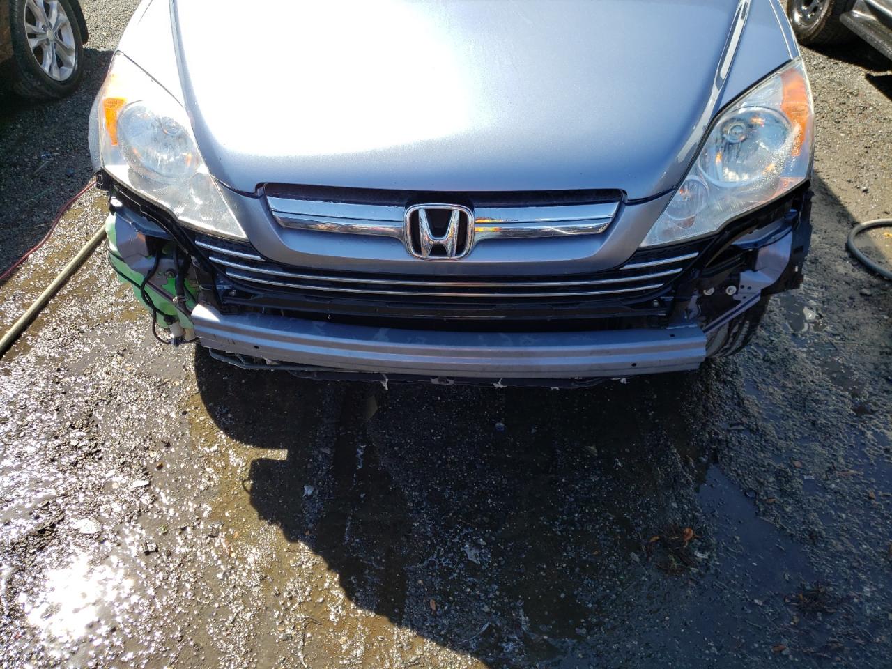 Photo 9 from auction – 2007 HONDA CR-V EX with VIN JHLRE38587C000382
