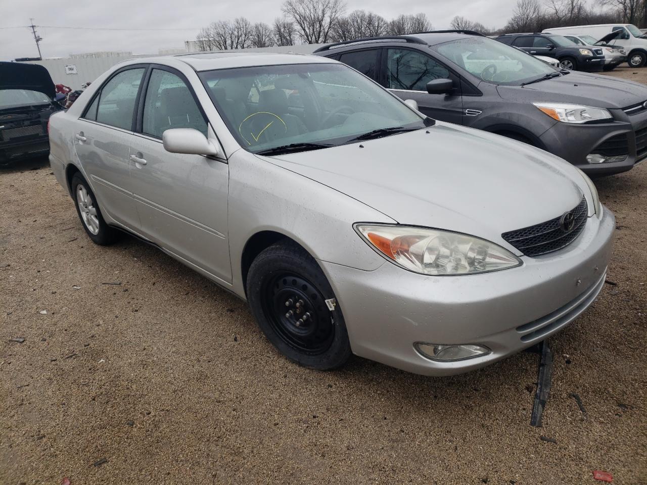 TOYOTA CAMRY LE 2003 with VIN 4T1BE30K23U752627 - Photo from auction