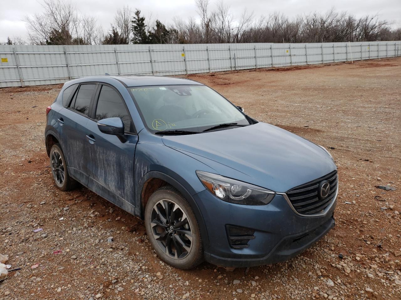 MAZDA CX-5 GT 2016 with VIN JM3KE2DY7G0912423 - Photo from auction