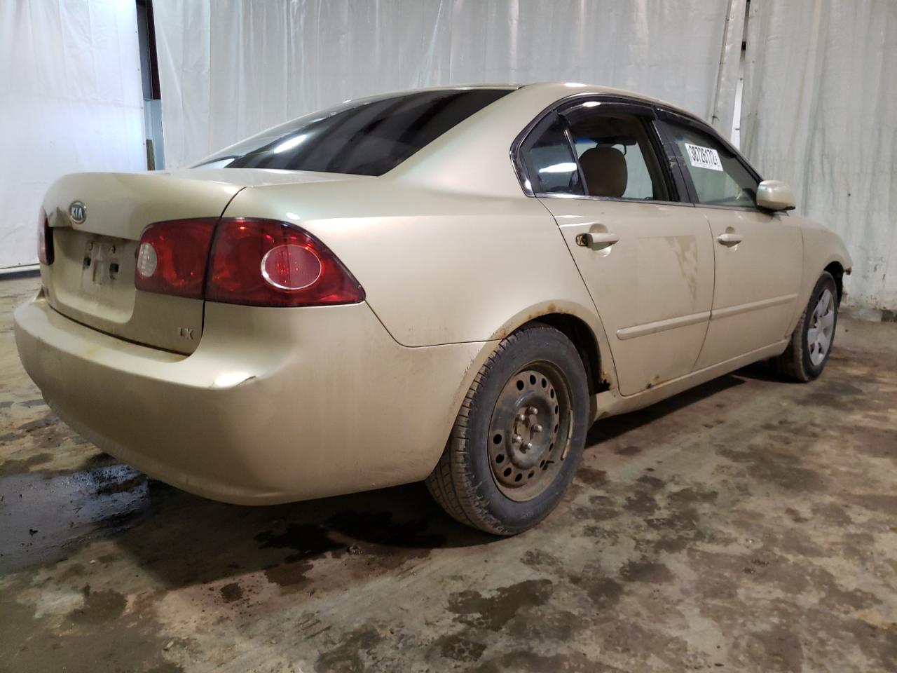 Photo 4 from auction – 2006 KIA OPTIMA LX with VIN KNAGE123765061674