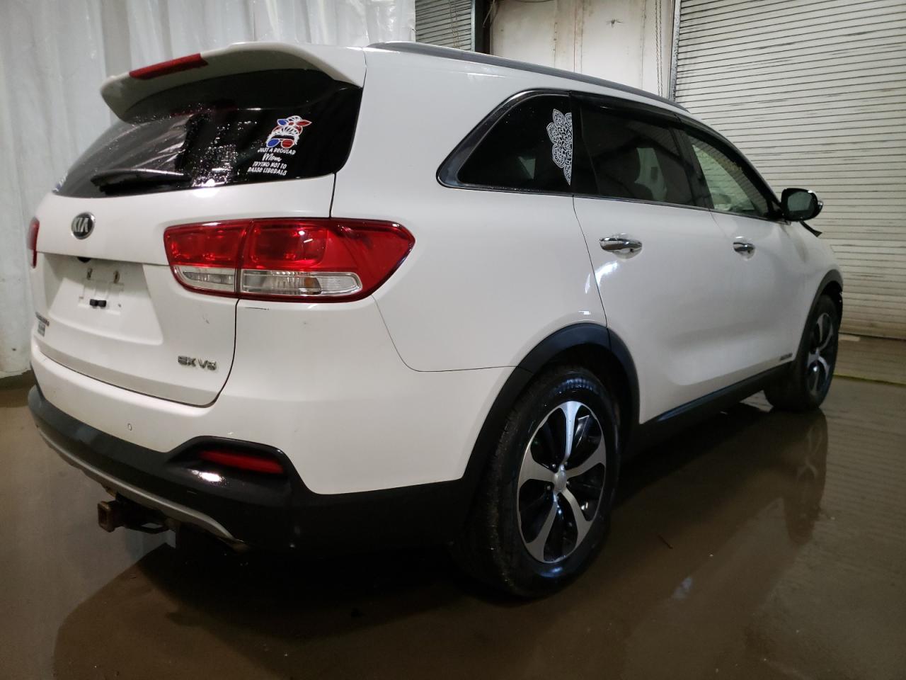 Photo 4 from auction – 2016 KIA SORENTO EX with VIN 5XYPHDA5XGG118117