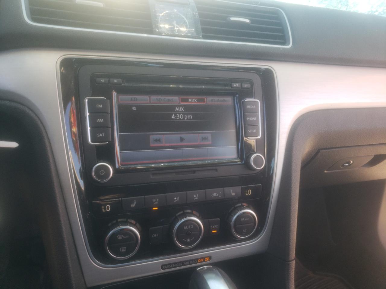 Photo 9 from auction – 2012 VOLKSWAGEN PASSAT SE with VIN 1VWBH7A32CC091887