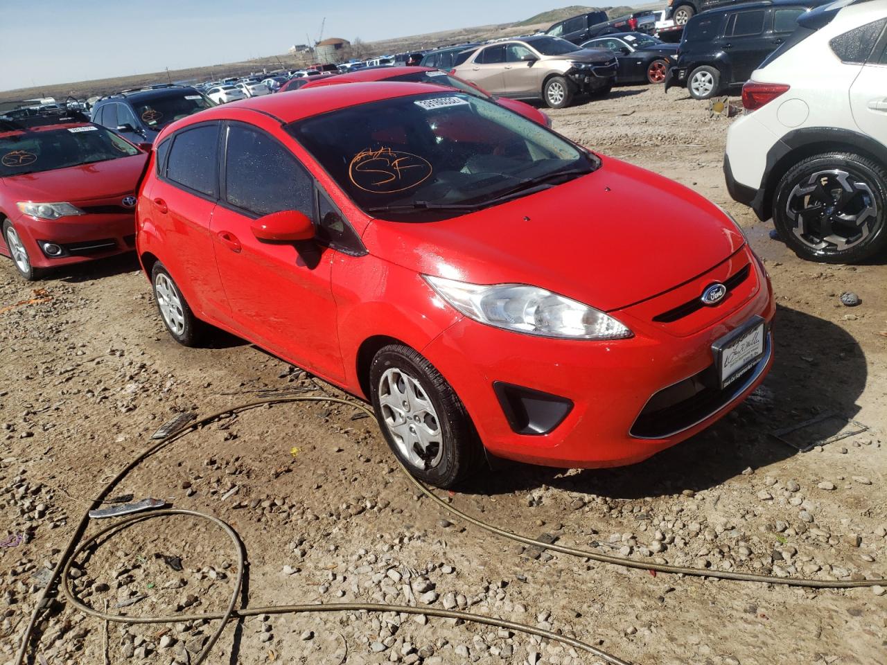 FORD FIESTA SE 2012 with VIN 3FADP4EJ7CM176394 - Photo from auction