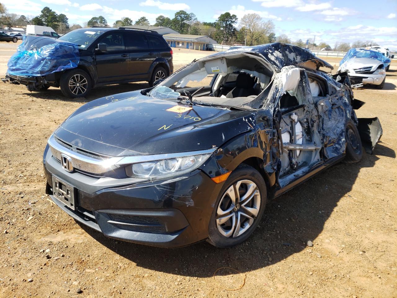 Photo 2 from auction – 2017 HONDA CIVIC LX with VIN 19XFC2F57HE003710