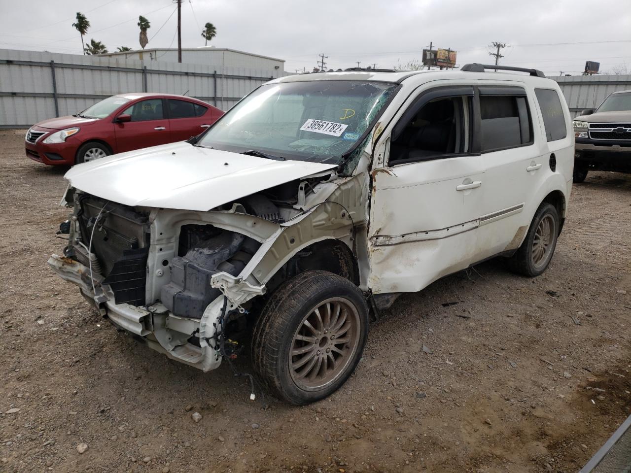 Photo 2 from auction – 2013 HONDA PILOT TOUR with VIN 5FNYF4H96DB040621
