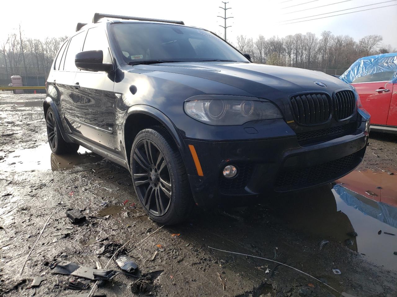 BMW X5 XDRIVE5 2011 with VIN 5UXZV8C5XBL418600 - Photo from auction