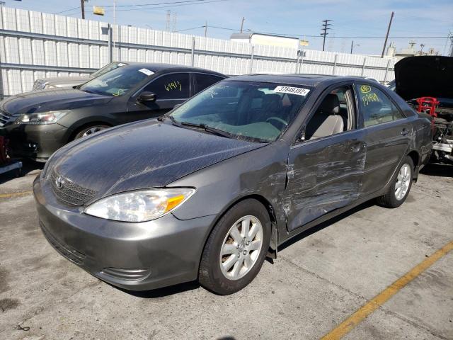 Photo 2 from auction – 2004 TOYOTA CAMRY LE with VIN 4T1BF32K44U586557
