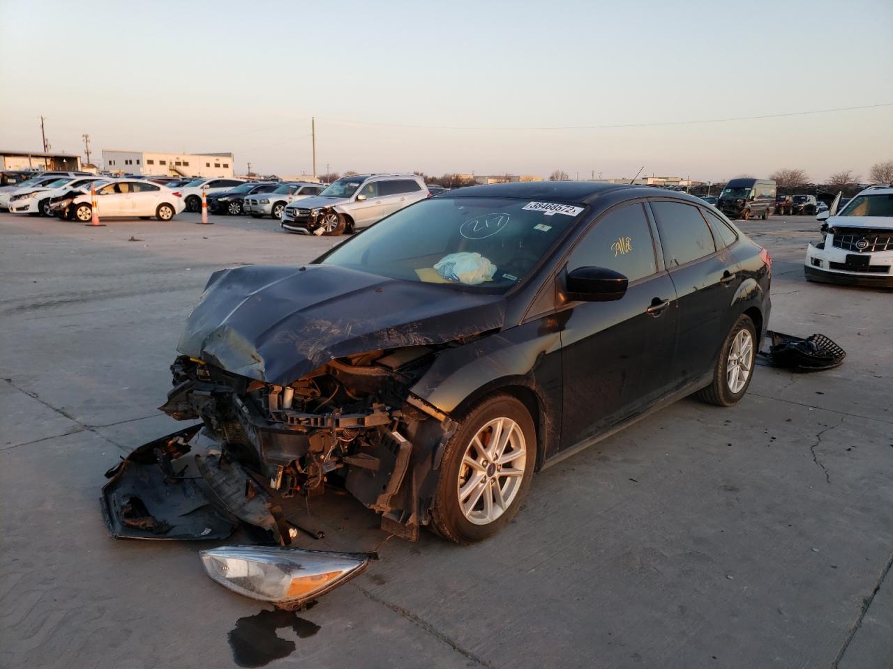 Photo 2 from auction – 2018 FORD FOCUS SE with VIN 1FADP3F20JL242042