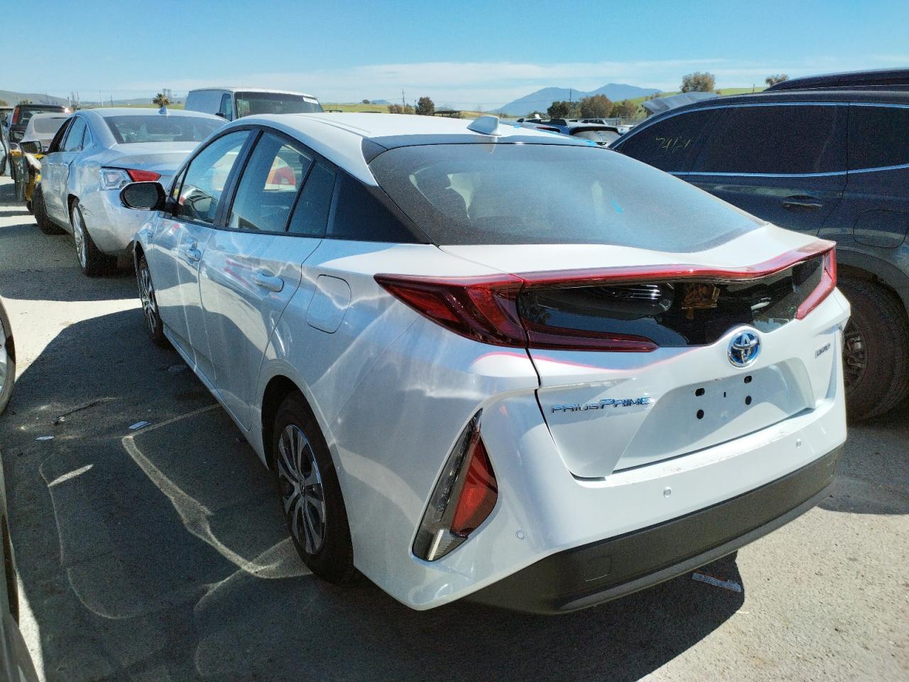 Photo 3 from auction – 2022 TOYOTA PRIUS PRIM with VIN JTDKAMFP4N3207868