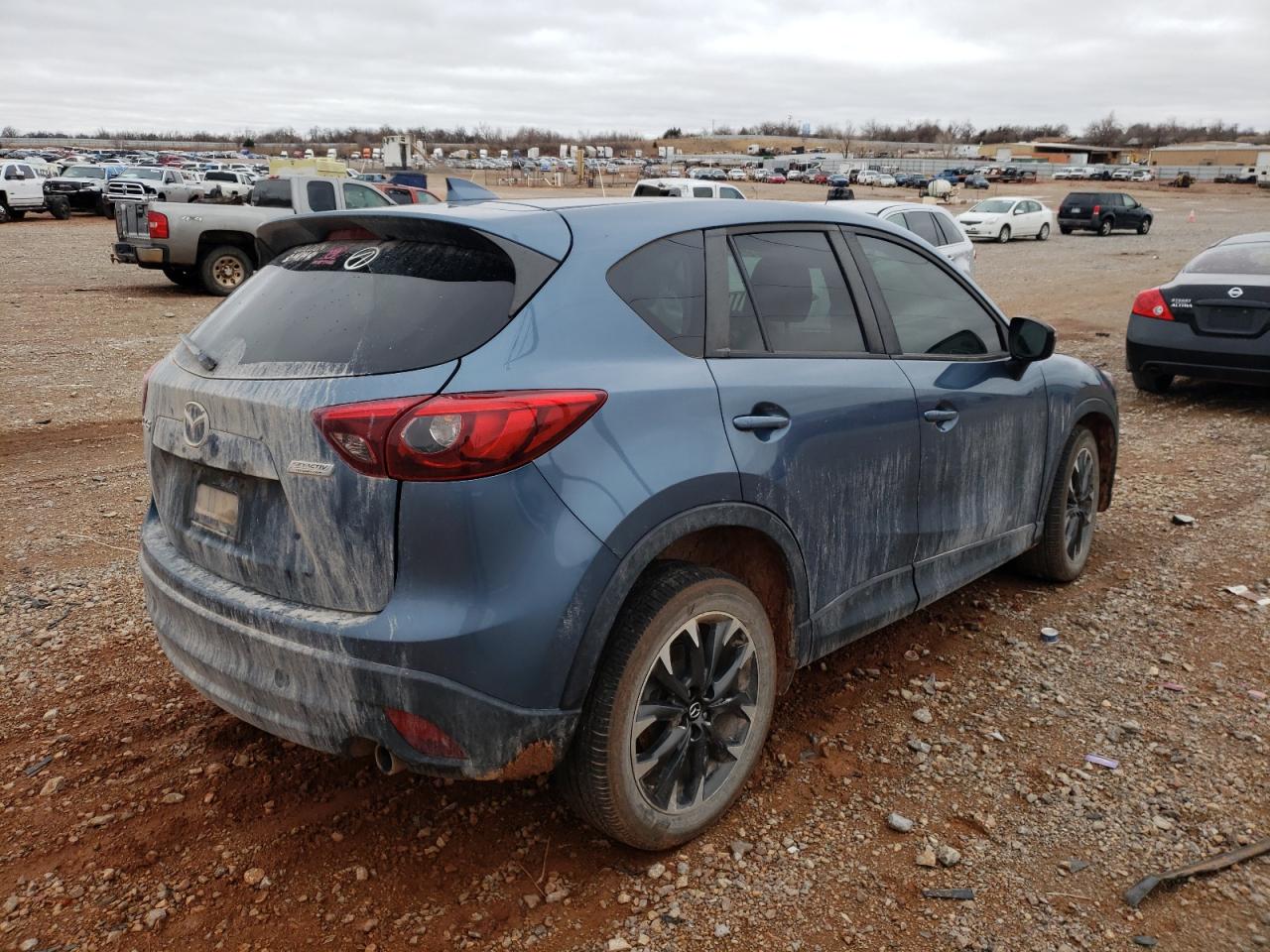 Photo 4 from auction – 2016 MAZDA CX-5 GT with VIN JM3KE2DY7G0912423