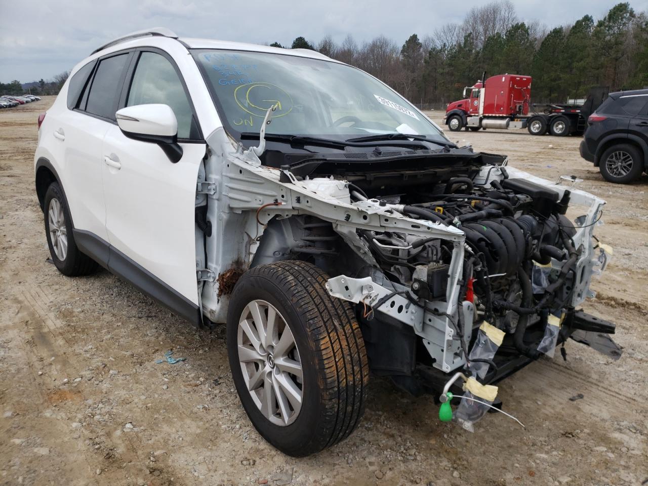 MAZDA CX-5 TOURI 2016 with VIN JM3KE2CY5G0797063 - Photo from auction