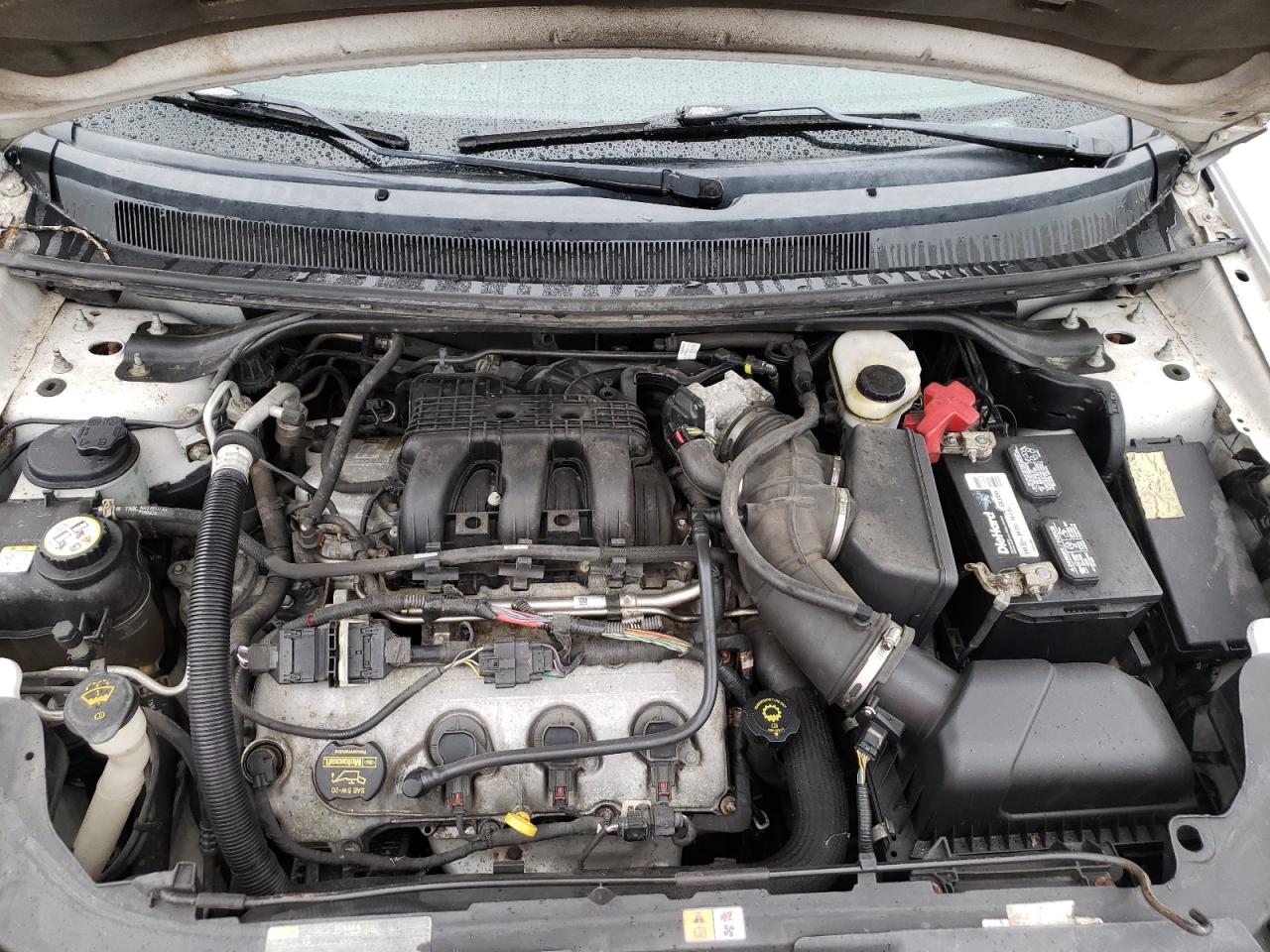 Photo 7 from auction – 2008 FORD TAURUS X S with VIN 1FMDK02W98GA39780