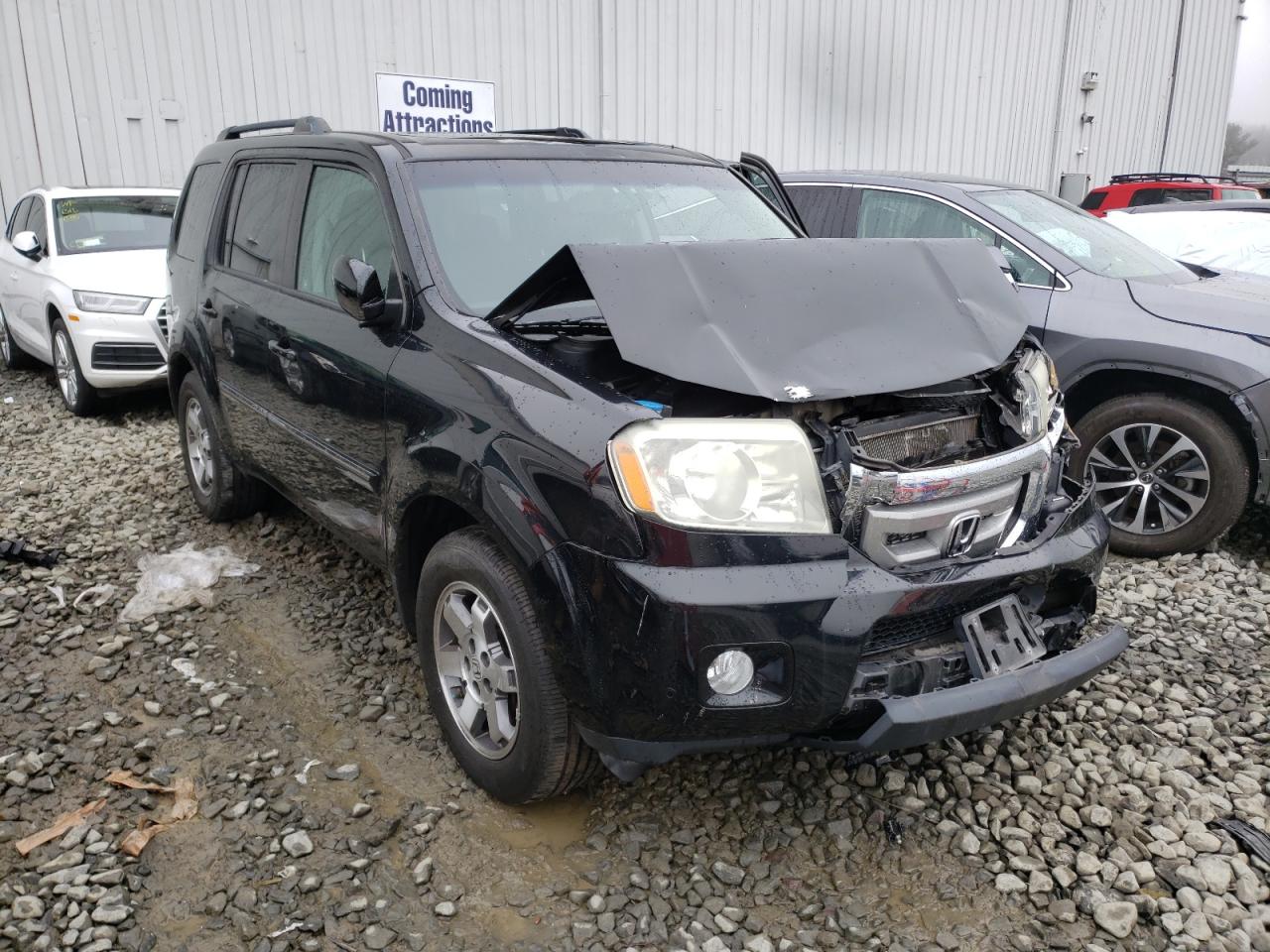 HONDA PILOT TOUR 2010 with VIN 5FNYF4H92AB010107 - Photo from auction
