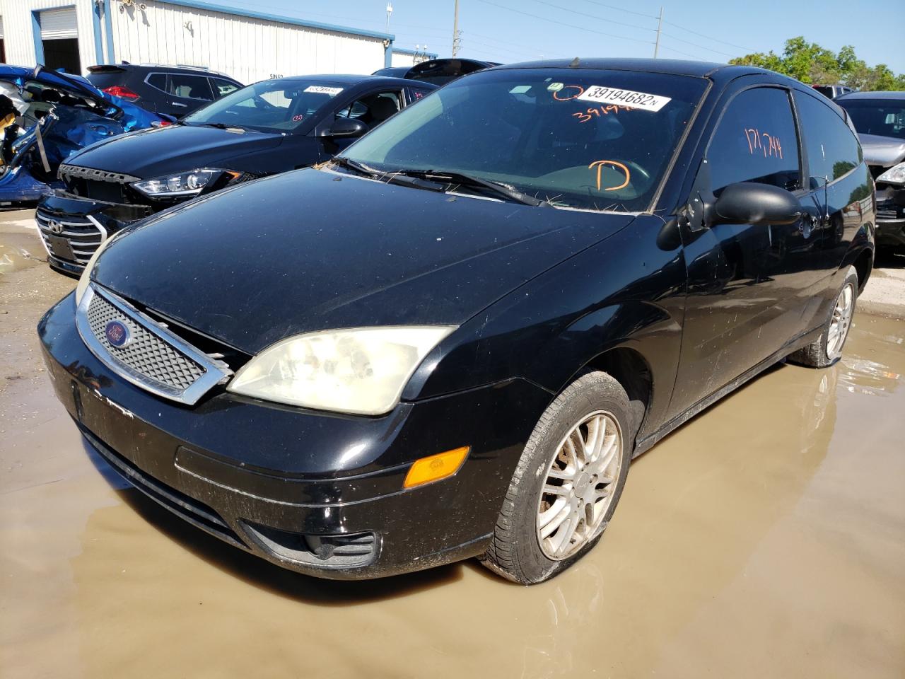 Photo 2 from auction – 2007 FORD FOCUS ZX3 with VIN 1FAFP31N77W348716