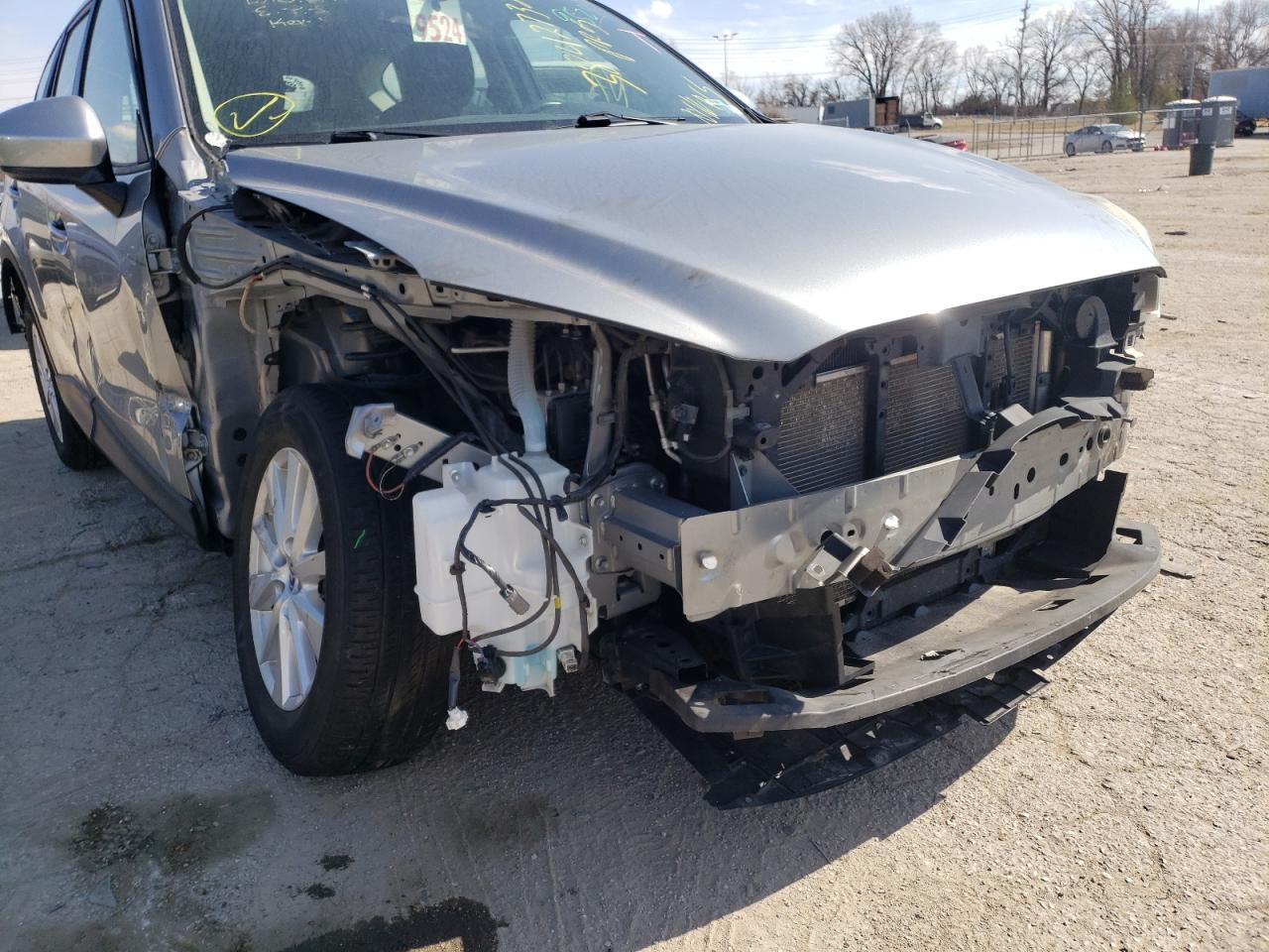Photo 9 from auction – 2014 MAZDA CX-5 SPORT with VIN JM3KE2BE0E0358115