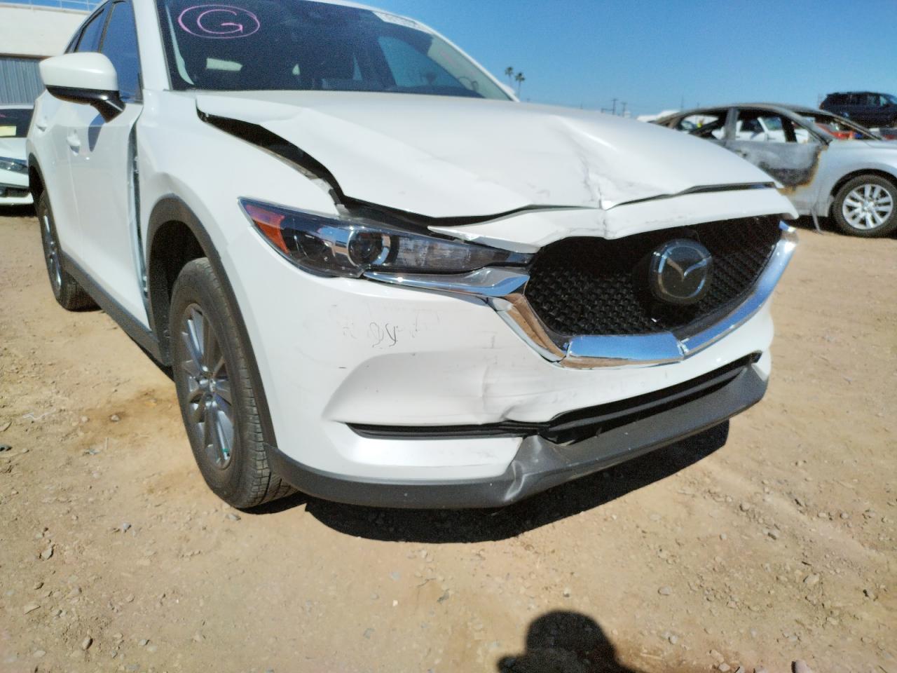 Photo 9 from auction – 2021 MAZDA CX-5 TOURI with VIN JM3KFACM6M0318617