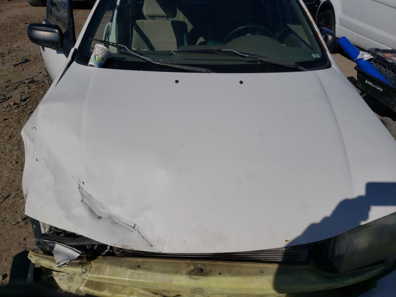 Photo 7 from auction – 1998 MAZDA PROTEGE DX with VIN JM1BC141XW0208811