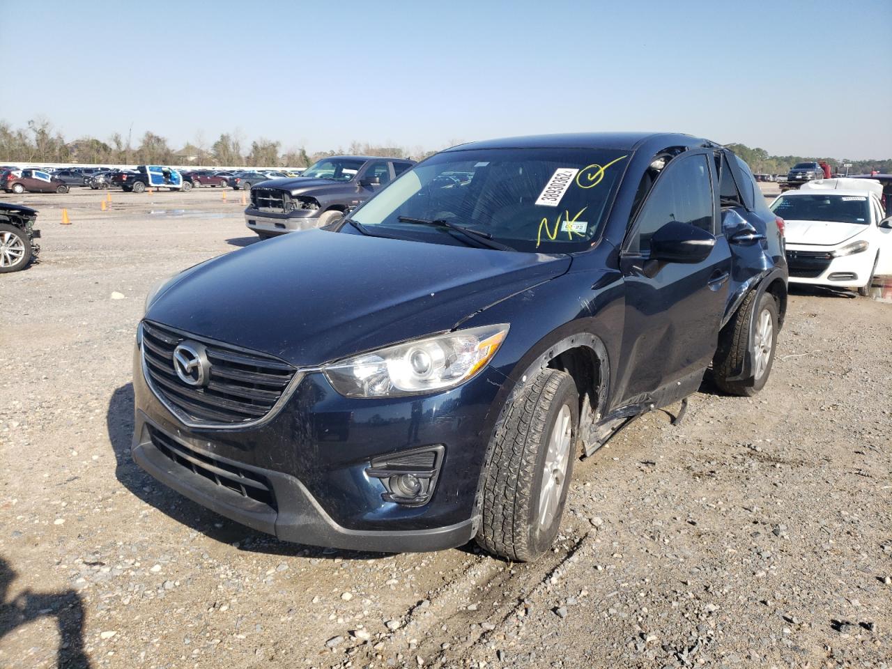 Photo 2 from auction – 2016 MAZDA CX-5 TOURI with VIN JM3KE2CY8G0740131