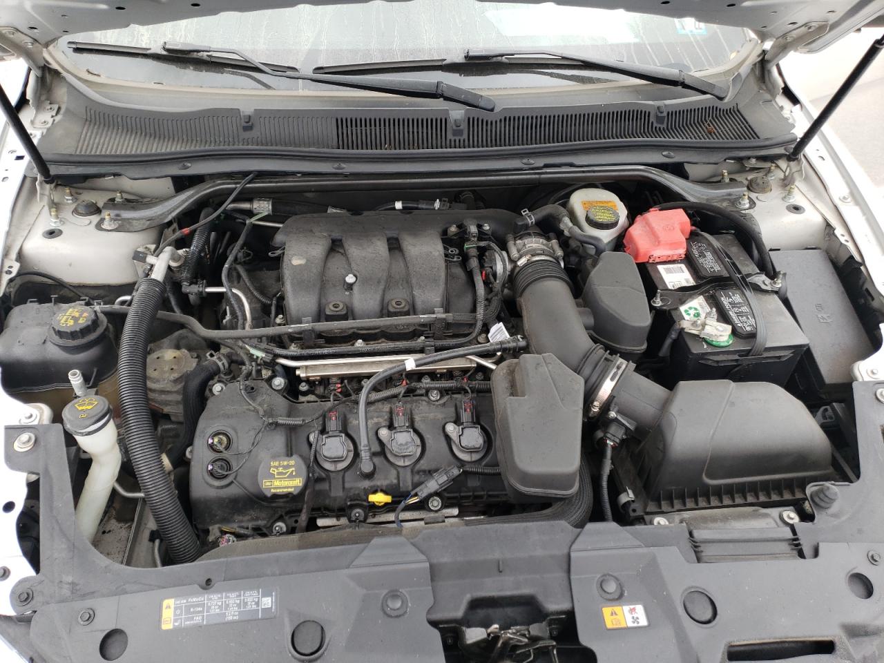 Photo 7 from auction – 2014 FORD TAURUS SEL with VIN 1FAHP2E80EG116991