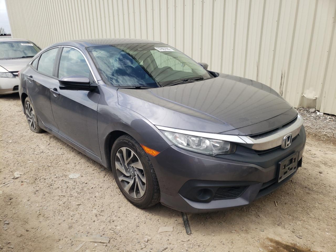 Photo 1 from auction – 2018 HONDA CIVIC EX with VIN 2HGFC2F89JH610679