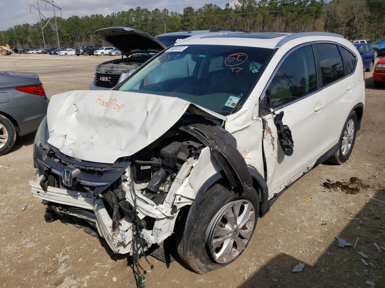 Photo 2 from auction – 2012 HONDA CR-V EXL with VIN 5J6RM3H71CL015019