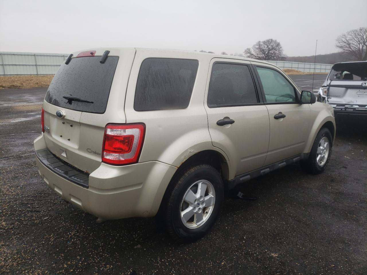 Photo 4 from auction – 2010 FORD ESCAPE XLS with VIN 1FMCU0C79AKD12054