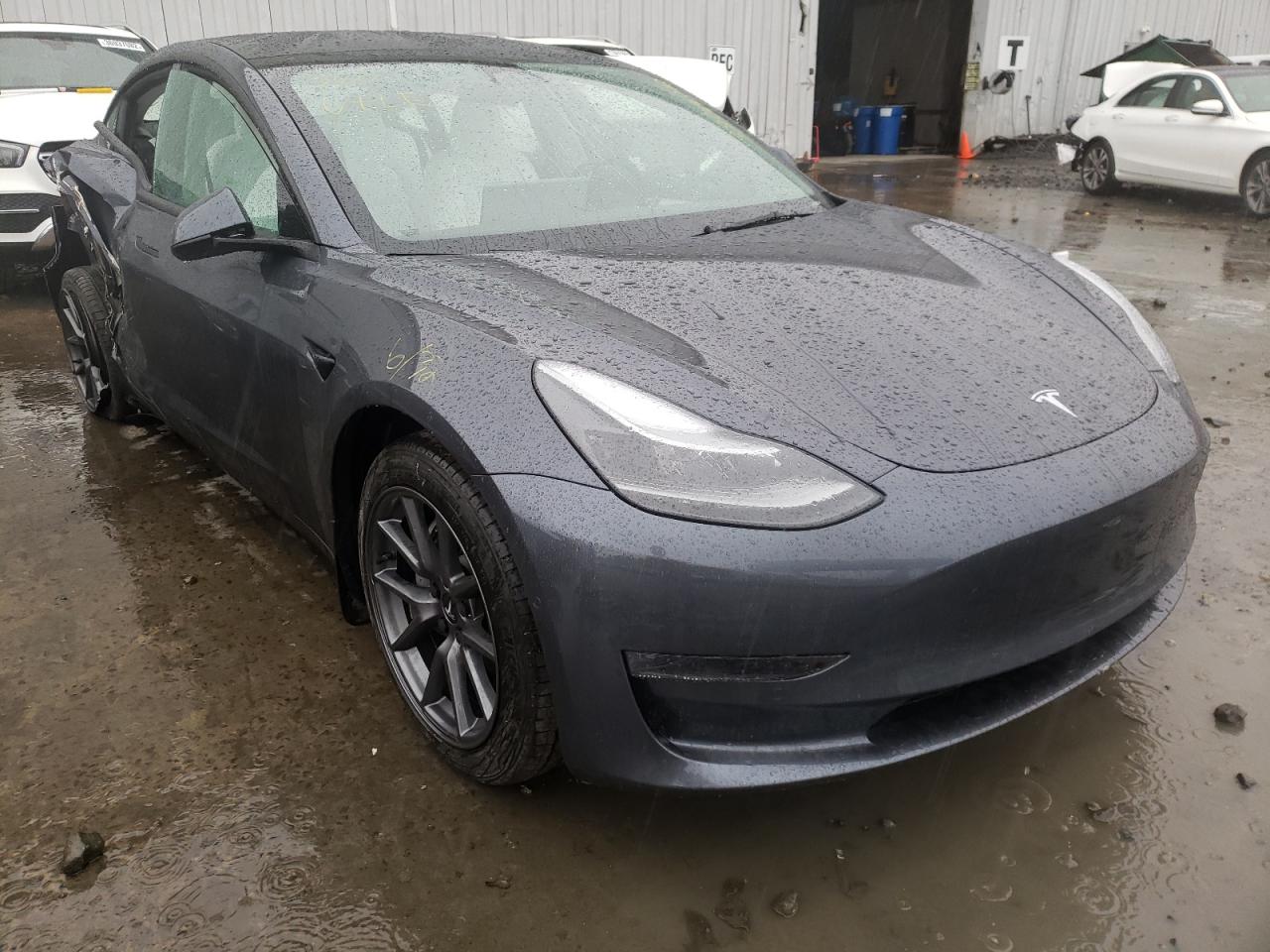 TESLA MODEL 3 2022 with VIN 5YJ3E1EB9NF167335 - Photo from auction