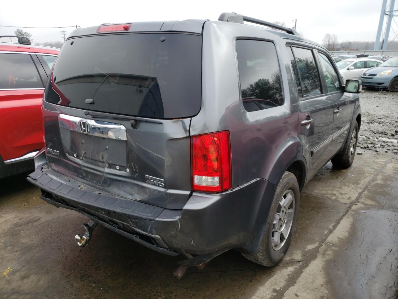 Фото 4 с аукциона – 2011 HONDA PILOT TOUR с VIN 5FNYF4H99BB092595