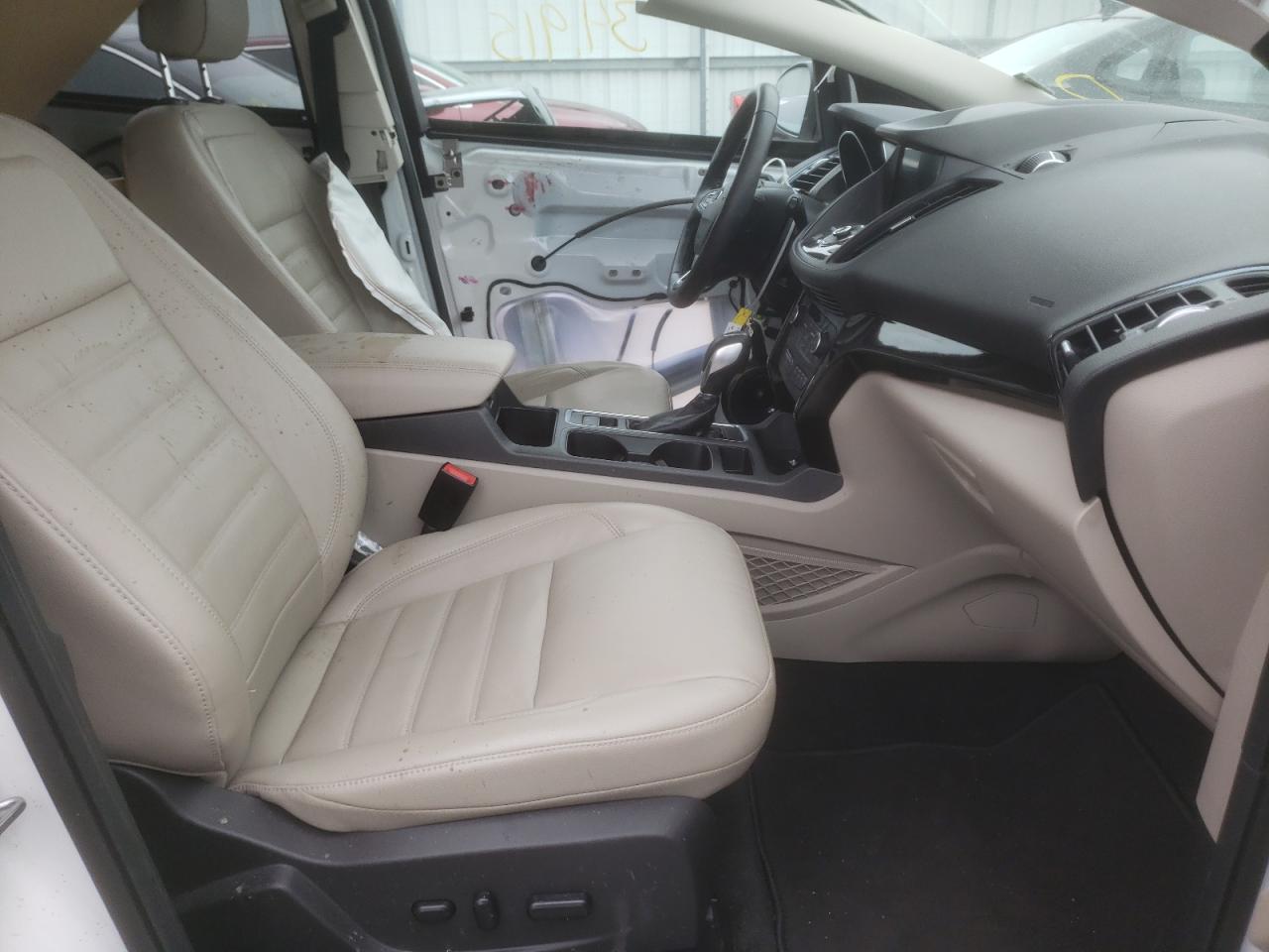 Photo 5 from auction – 2019 FORD ESCAPE TIT with VIN 1FMCU9J94KUB19177