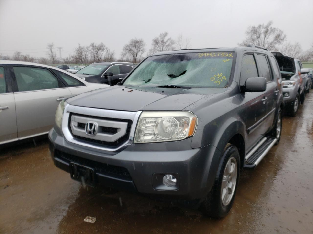 Photo 2 from auction – 2011 HONDA PILOT EXL with VIN 5FNYF4H62BB056379