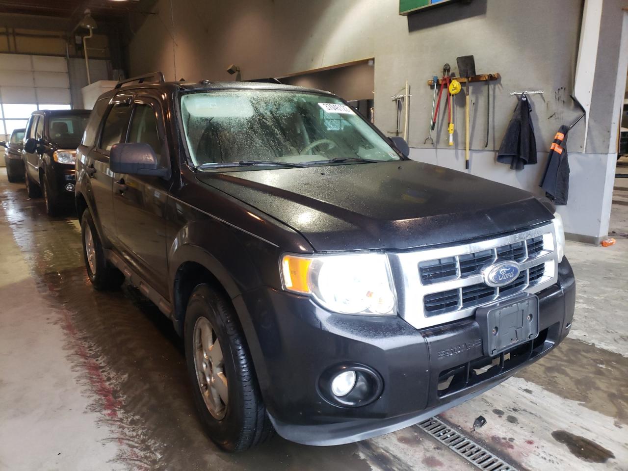 FORD ESCAPE XLT 2009 with VIN 1FMCU93G29KC12863 - Photo from auction