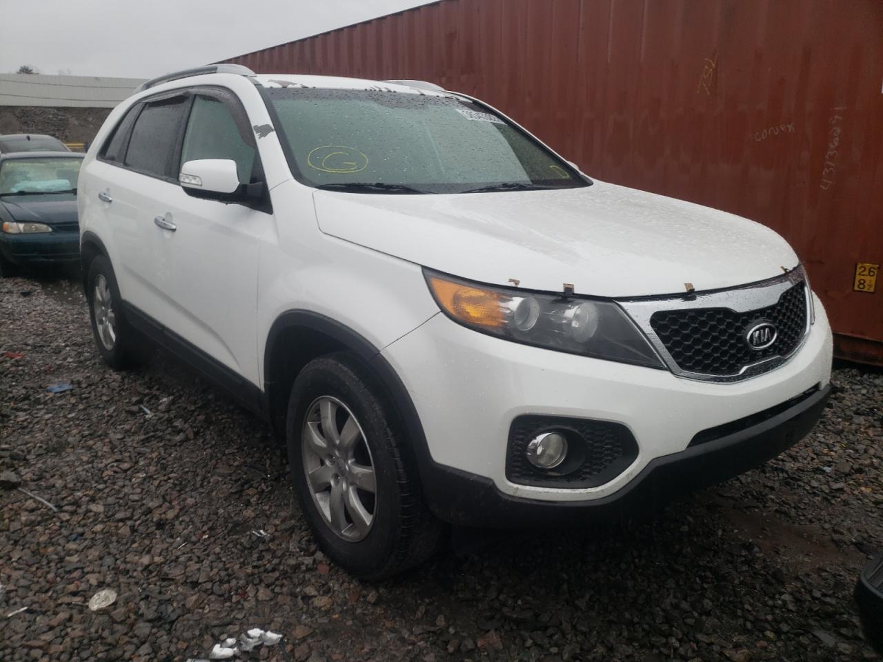 KIA SORENTO LX 2013 with VIN 5XYKT3A64DG401488 - Photo from auction