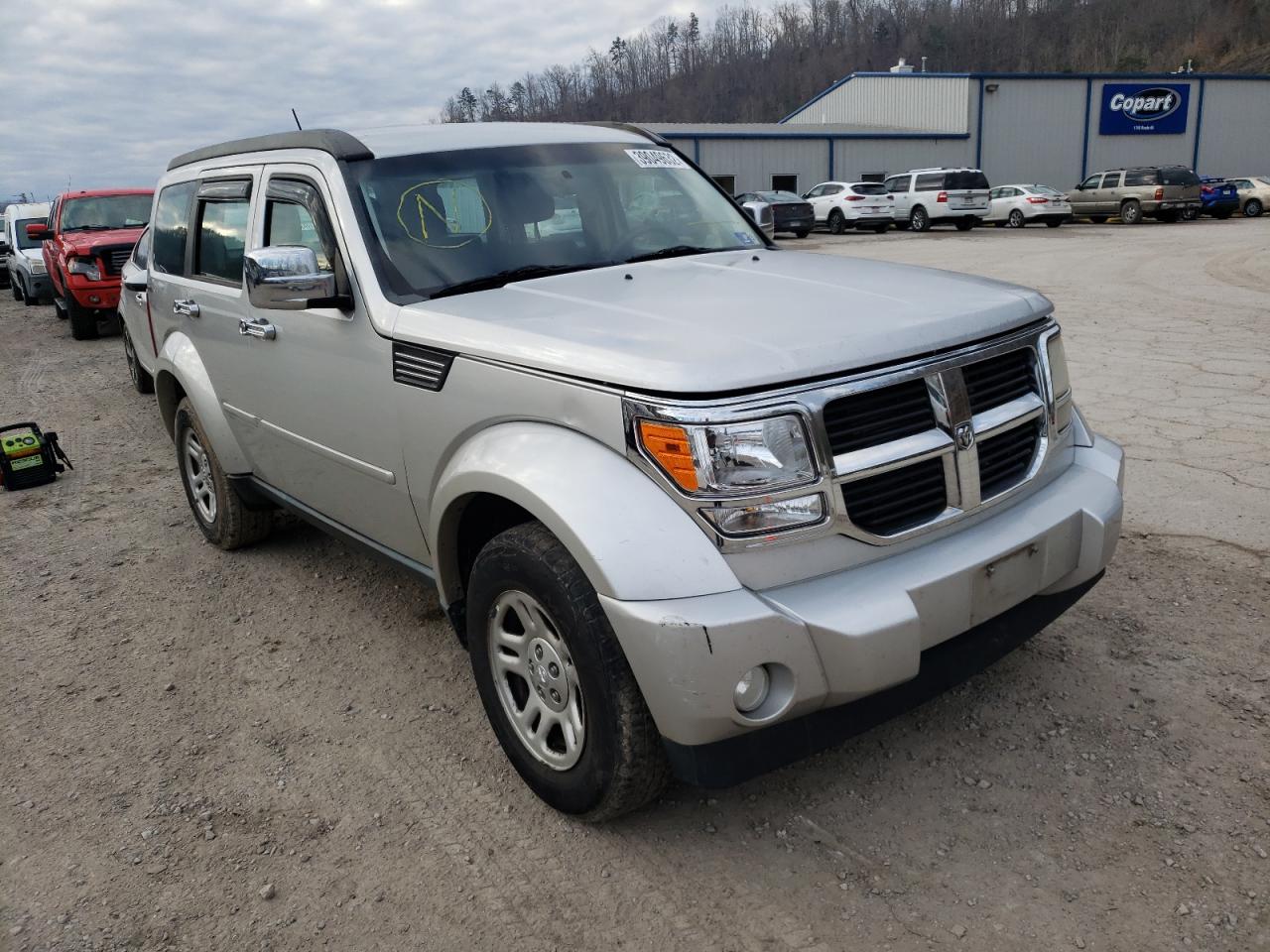 DODGE NITRO SE 2011 with VIN 1D4PU2GK5BW599261 - Photo from auction
