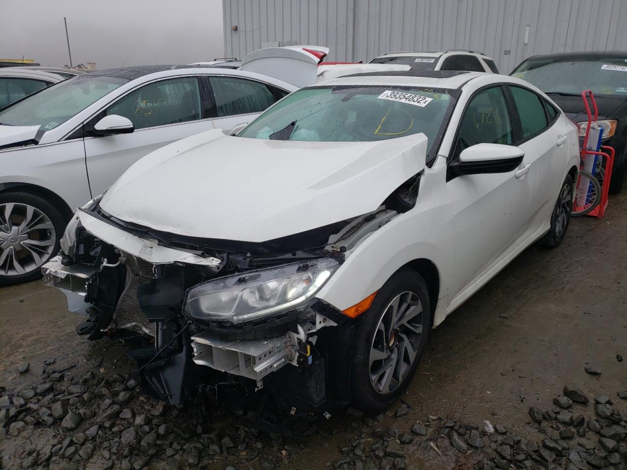 Photo 2 from auction – 2017 HONDA CIVIC EX with VIN 2HGFC2F76HH542407