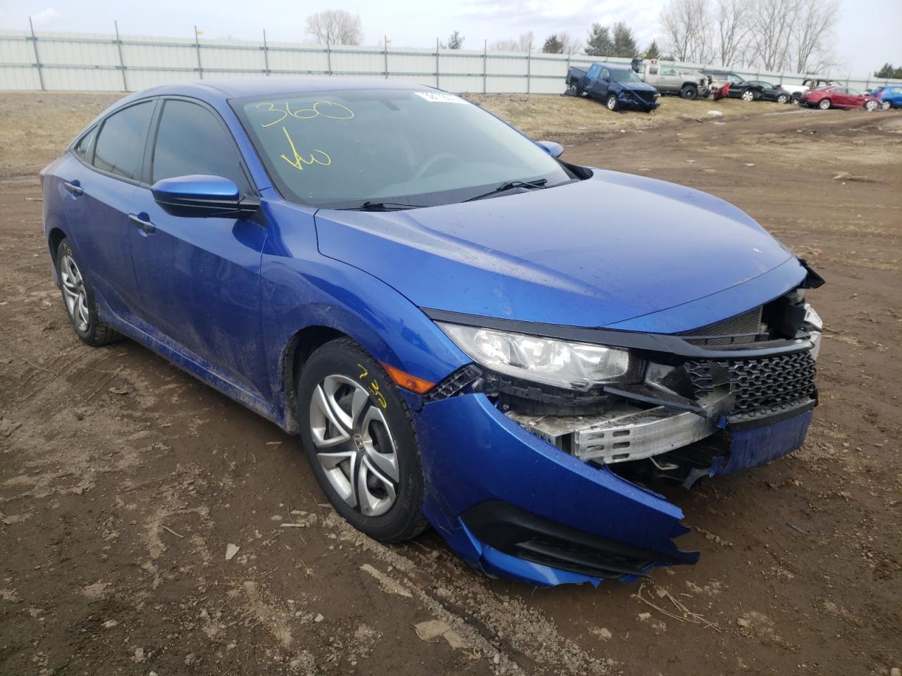 HONDA CIVIC LX 2017 with VIN 19XFC2F57HE002055 - Photo from auction
