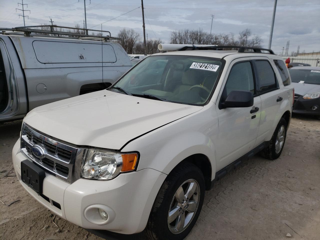 Photo 2 from auction – 2011 FORD ESCAPE XLT with VIN 1FMCU9DG1BKB21443