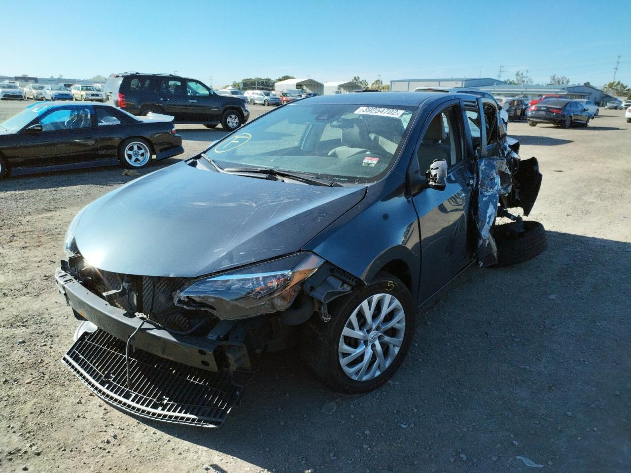 Photo 2 from auction – 2017 TOYOTA COROLLA L with VIN 5YFBURHE0HP694563