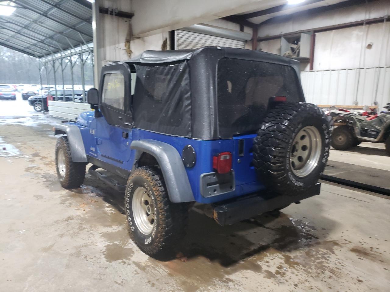 Photo 3 from auction – 2003 JEEP WRANGLER C with VIN 1J4FA39SX3P333986