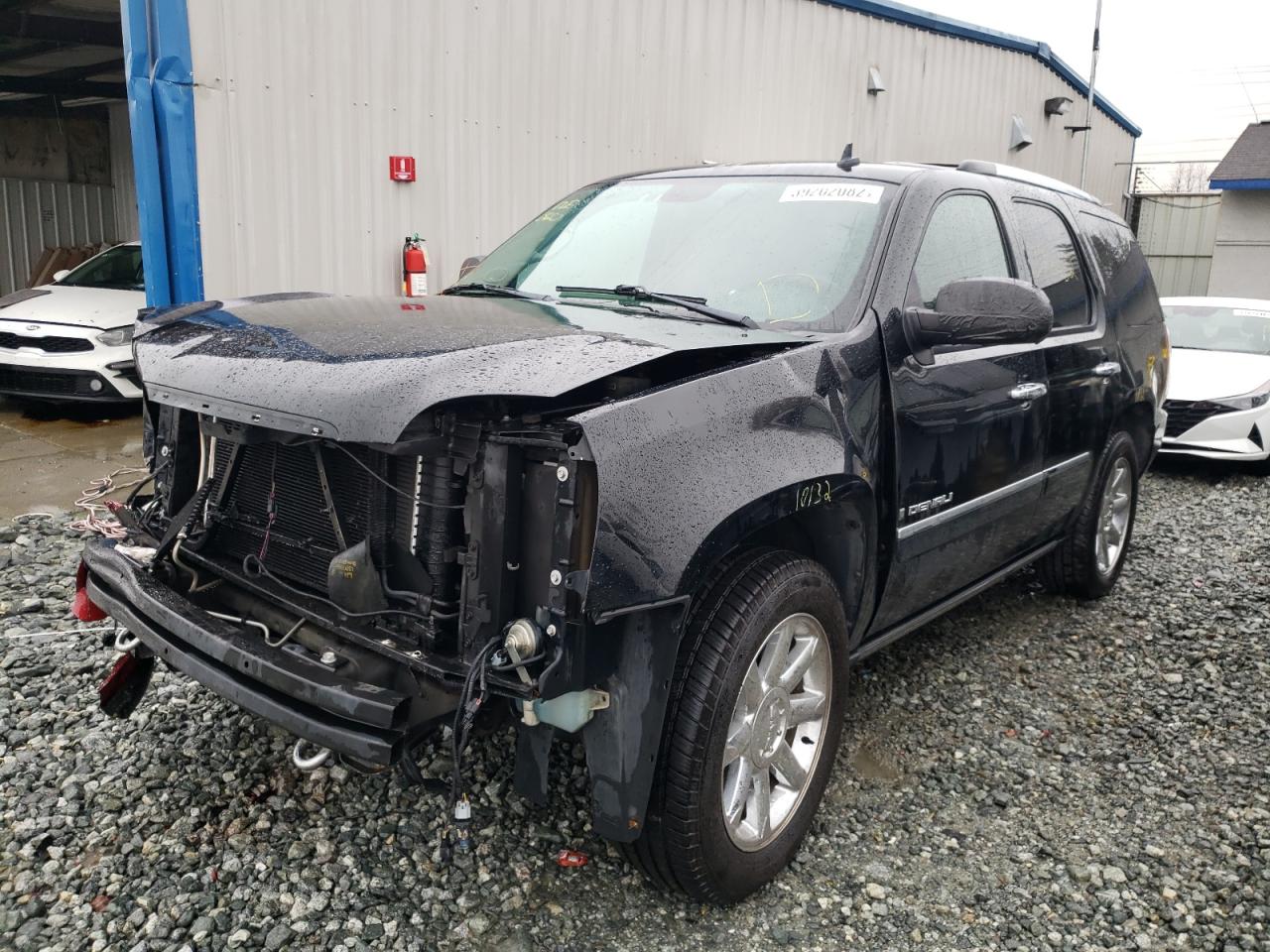 Photo 2 from auction – 2009 GMC YUKON DENA with VIN 1GKFC03299J117604