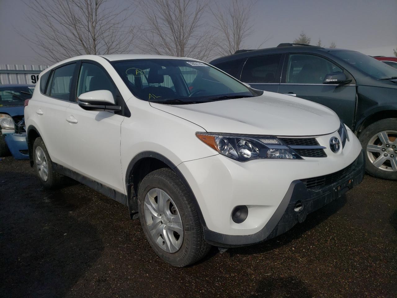 TOYOTA RAV4 LE 2015 with VIN 2T3BFREV0FW371695 - Photo from auction