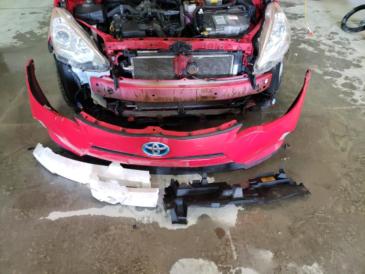 Photo 9 from auction – 2014 TOYOTA PRIUS C with VIN JTDKDTB36E1559785