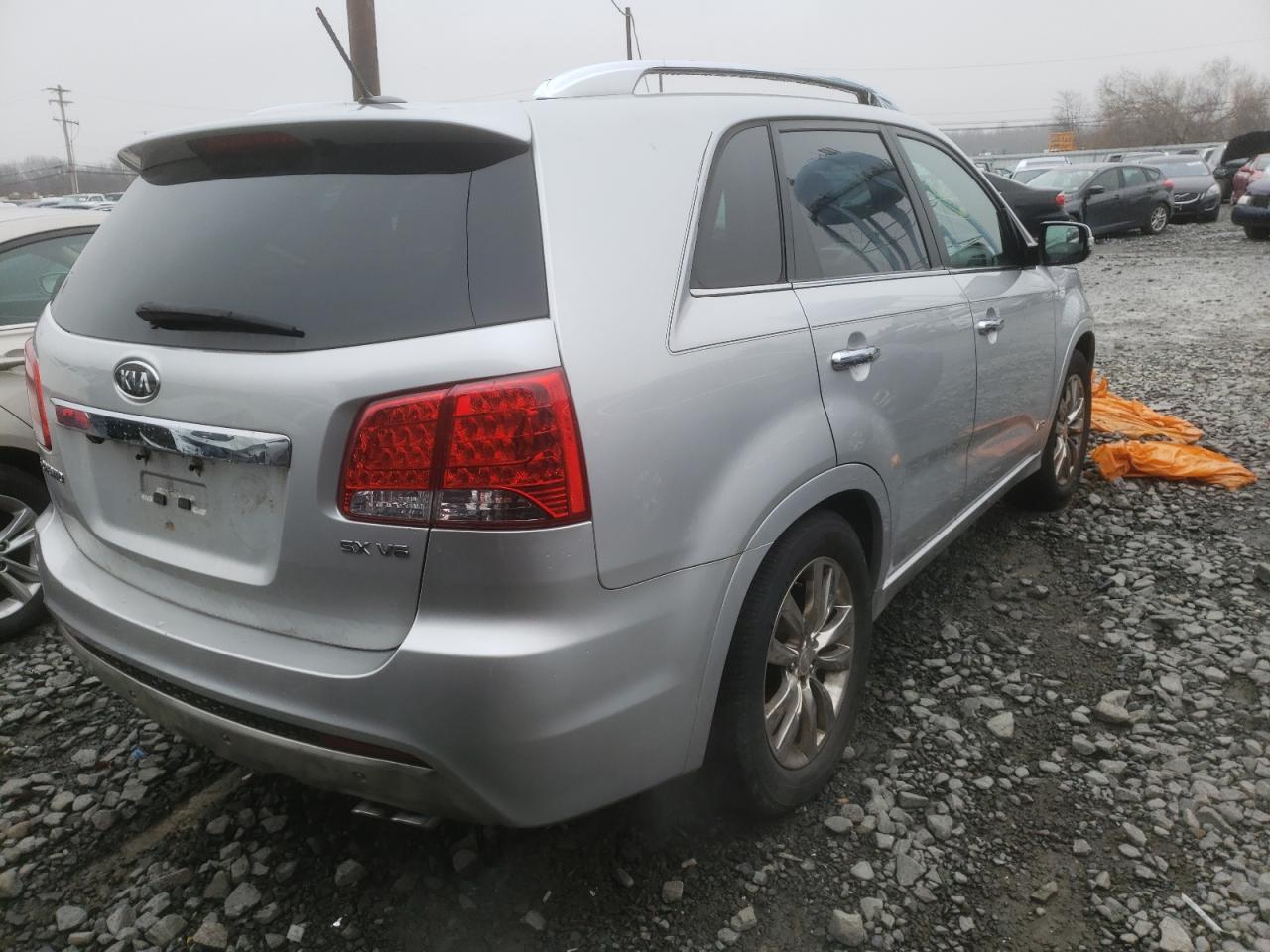 Photo 4 from auction – 2011 KIA SORENTO SX with VIN 5XYKWDA26BG100745
