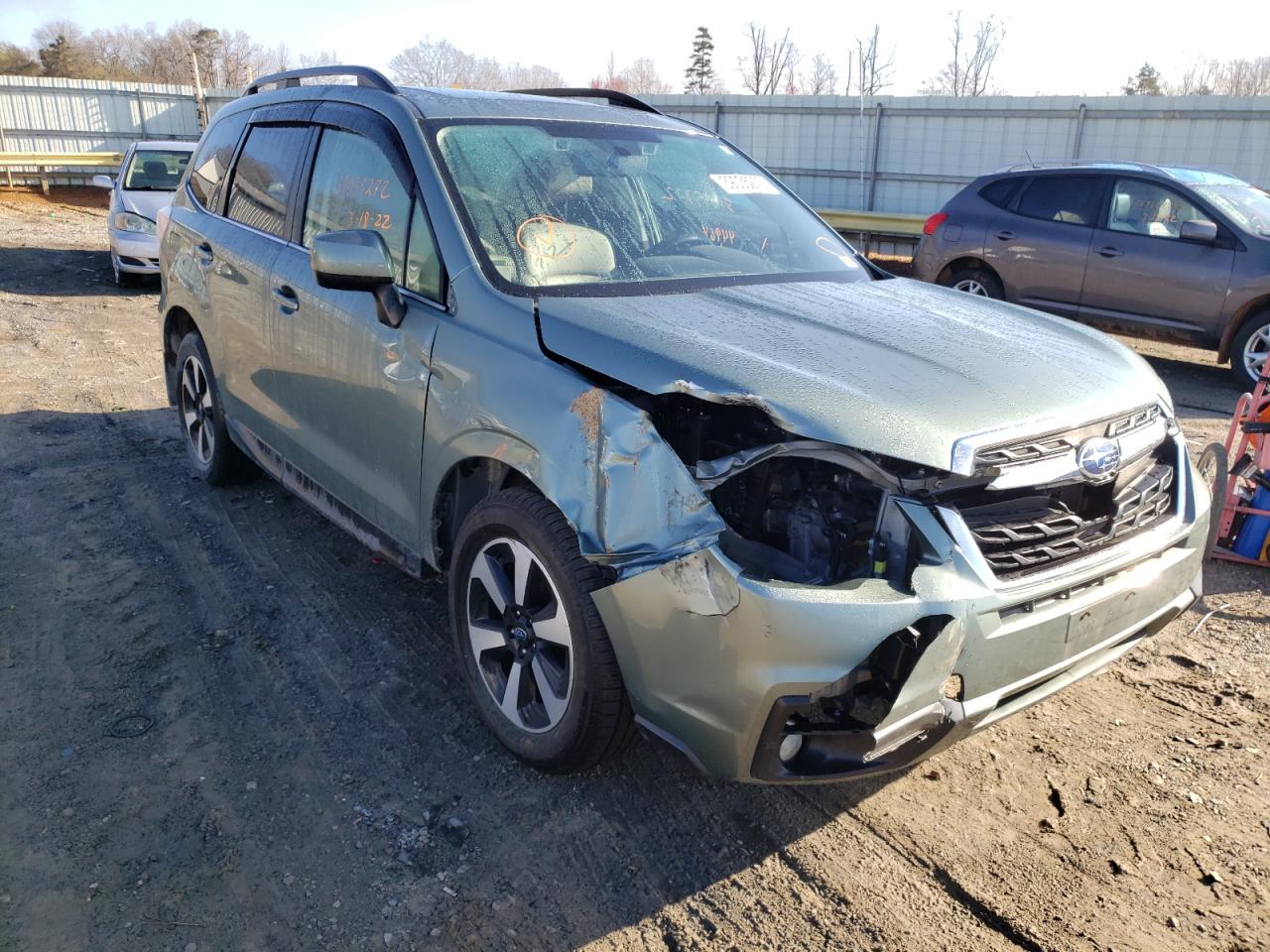 SUBARU FORESTER 2018 with VIN JF2SJARC4JH400978 - Photo from auction