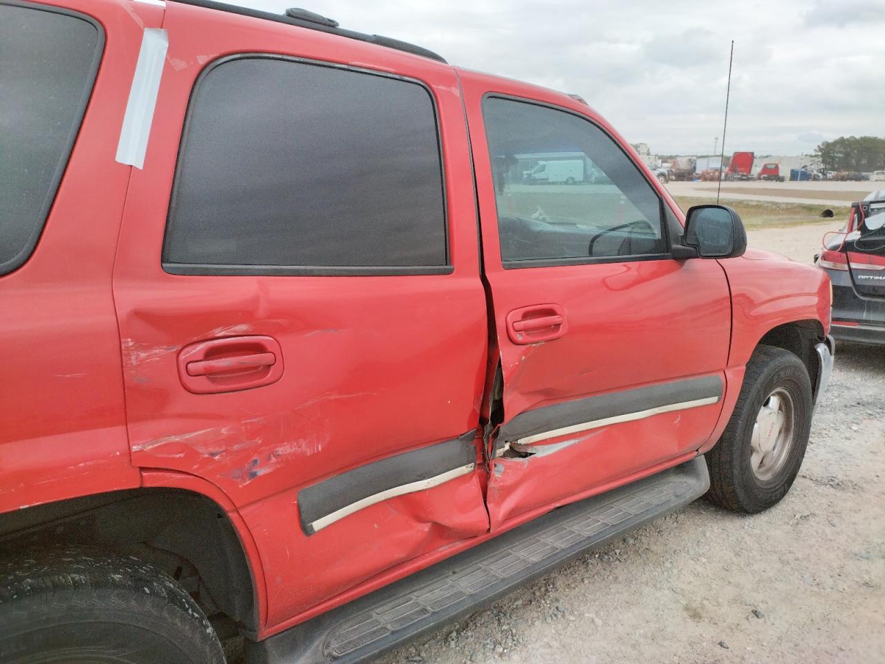 Photo 10 from auction – 2001 GMC YUKON with VIN 1GKEC13TX1R206923