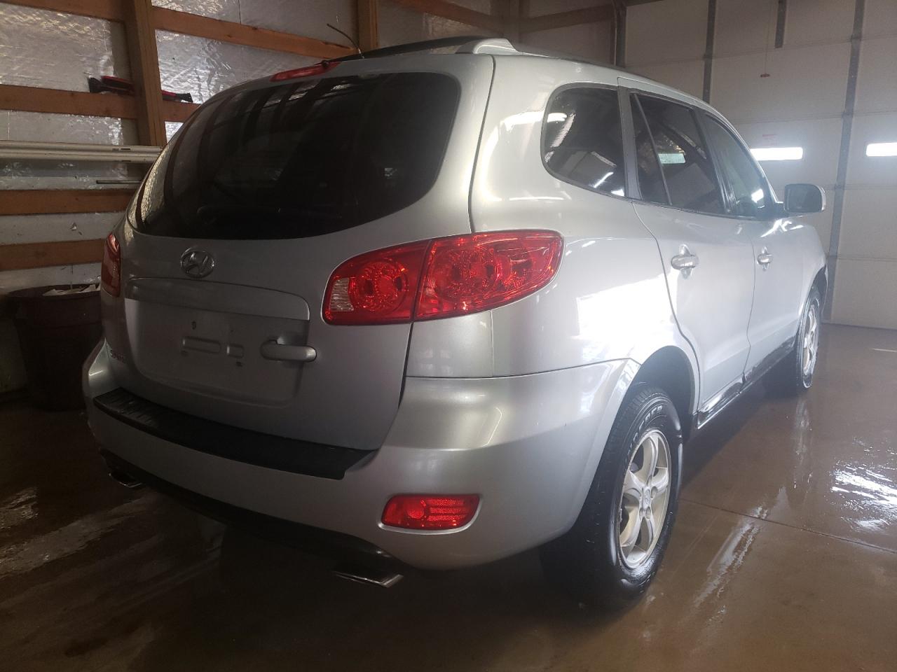 Photo 4 from auction – 2007 HYUNDAI SANTA FE G with VIN 5NMSG13DX7H117653